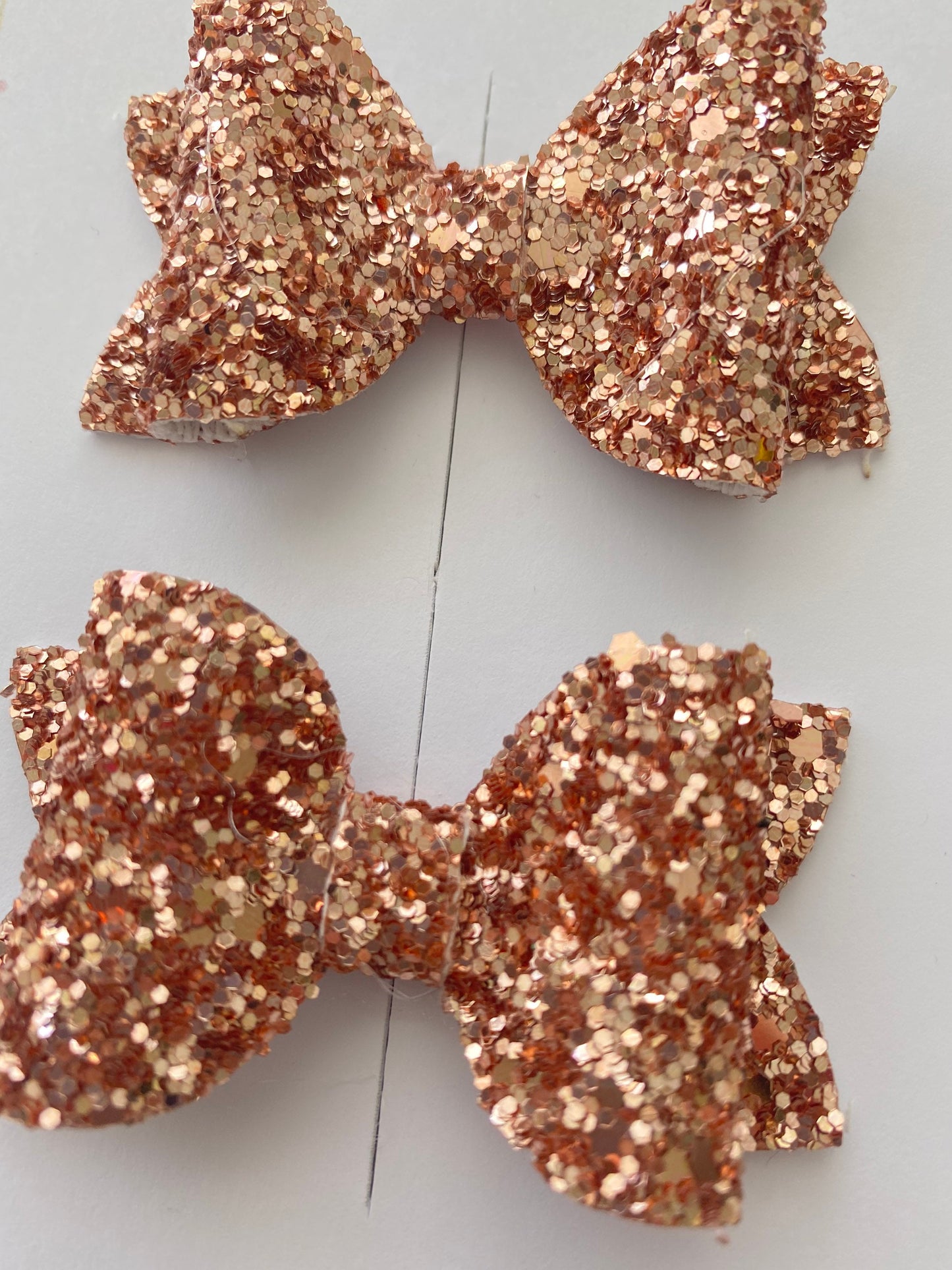 Pair of Glitter Hair Bow Clips in Rose Gold