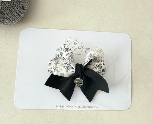 Black & White Halloween Bow Clip– Skull Print Bow with Charm