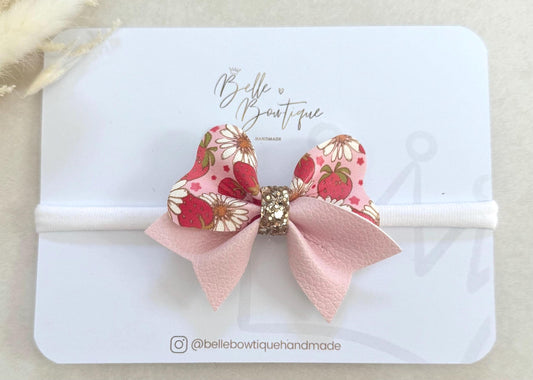 Pink Strawberry headband on a soft nylon dainty headband for toddlers, babies up to adult