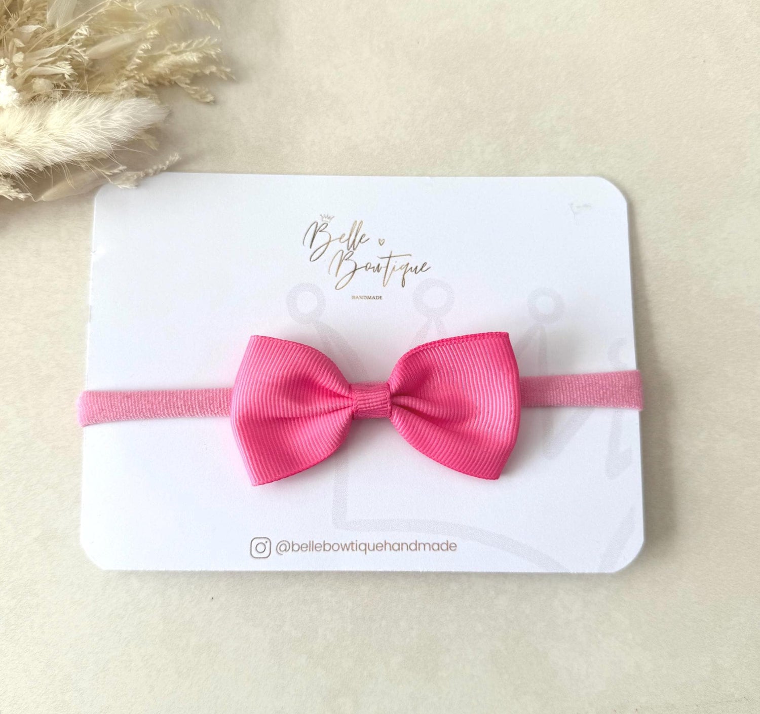 Pink Grosgrain ribbon bow headband on a nylon dainty headband for baby girl toddler and adult