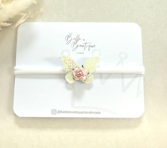 Pink and white butterfly baby headband on a soft nylon dainty headband for toddlers, babies up to adult